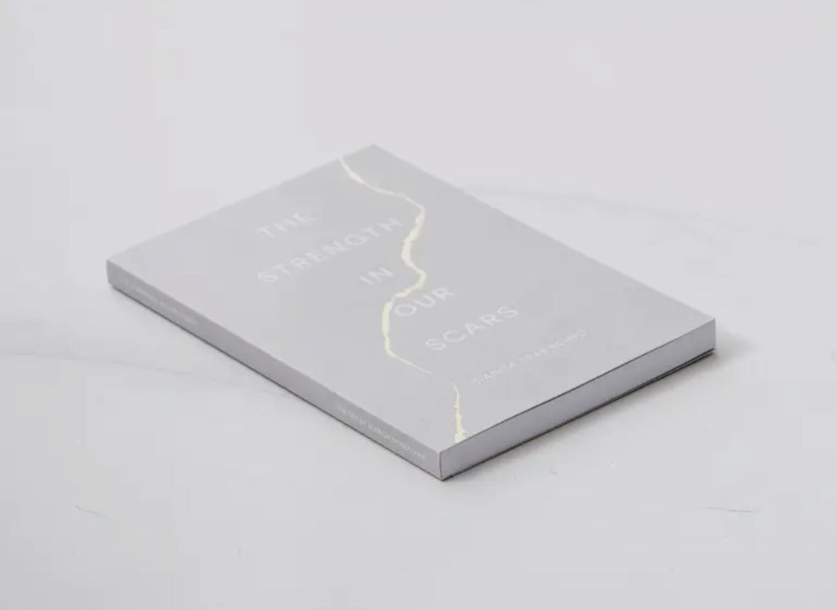 The Strength In Our Scars - Book